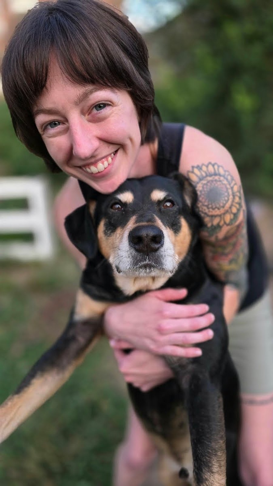 Averyl, groomer at Pawtastic Mobile Pet Spa, with her own dog